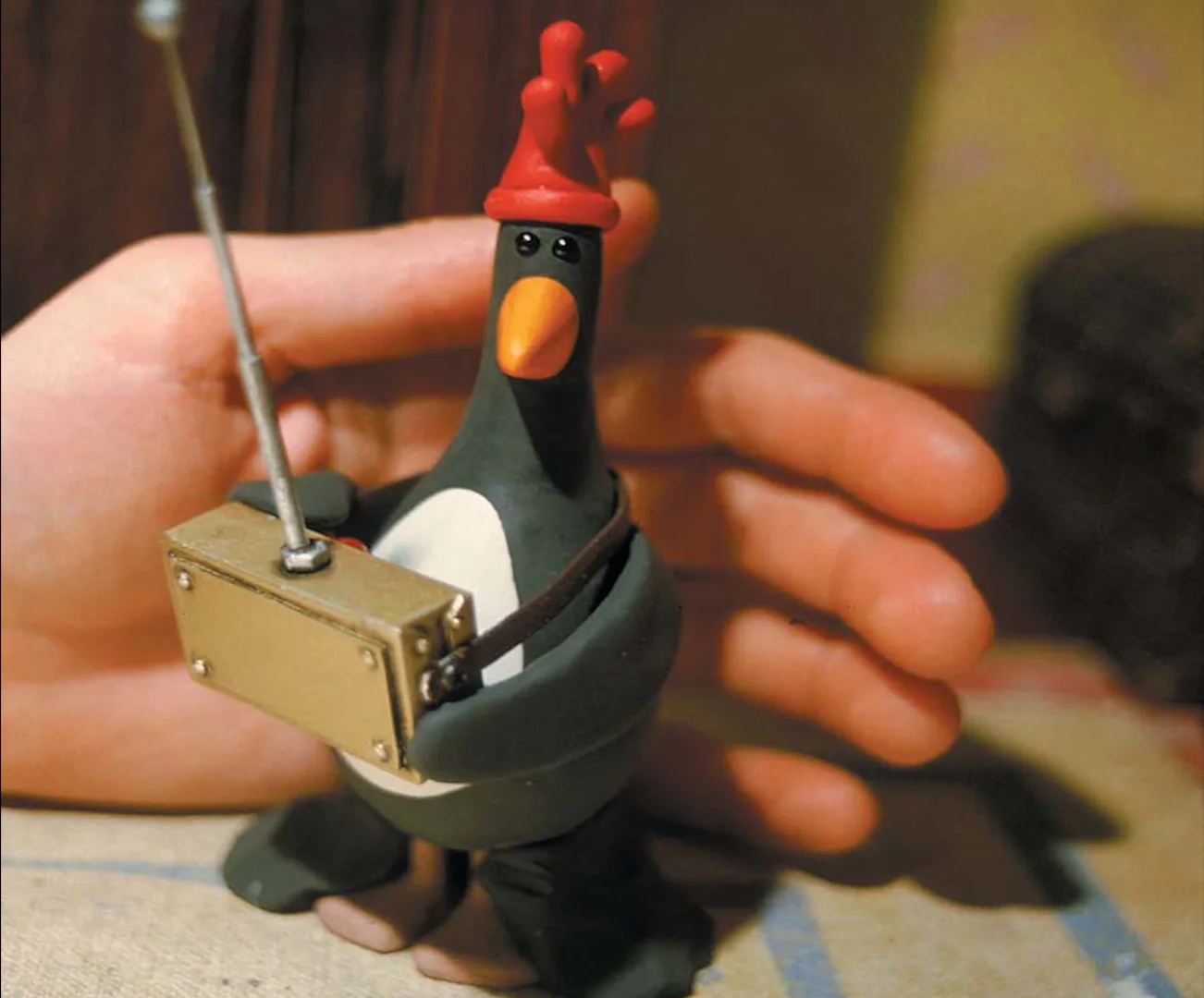 A close-up of the Feathers McGraw model wearing his radio-control disguise during production of The Wrong Trousers